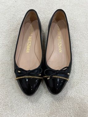 Stuart Weitzman Black Patent Leather Bow Flats with Gold Chain